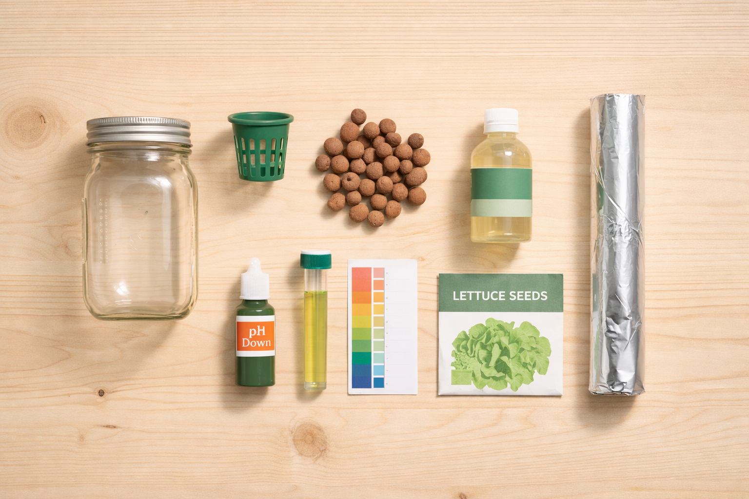 Hydroponic starter supplies laid out on a table including mason jar net pot clay pebbles nutrients pH test kit and seeds